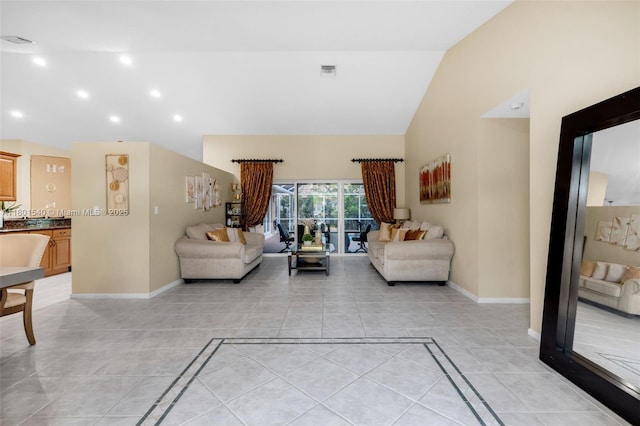 1708 NW 126th Dr, Coral Springs, FL 33071 - living area featuring light tile patterned flooring, baseboards, high vaulted ceiling, and recessed lighting