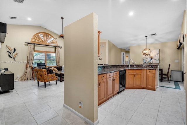 1708 NW 126th Dr, Coral Springs, FL 33071 - kitchen with dishwasher, light tile patterned floors, dark stone counters, a sink, and vaulted ceiling