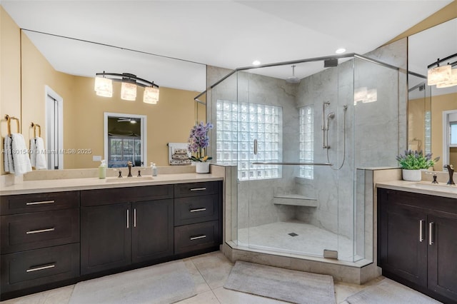 1708 NW 126th Dr, Coral Springs, FL 33071 - bathroom with a stall shower, two vanities, recessed lighting, and tile patterned floors