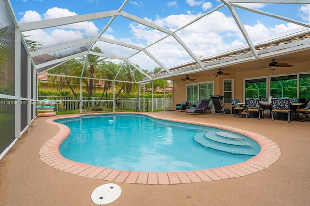 1708 NW 126th Dr, Coral Springs, FL 33071 - view of swimming pool featuring a ceiling fan, a patio, glass enclosure, and fence