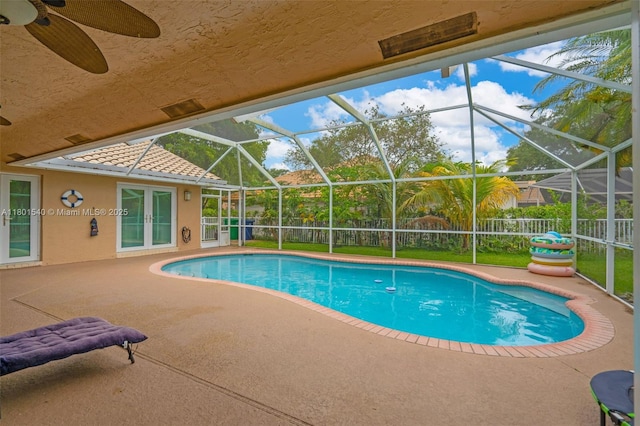 1708 NW 126th Dr, Coral Springs, FL 33071 - view of swimming pool with a patio, a fenced backyard, a ceiling fan, and a lanai