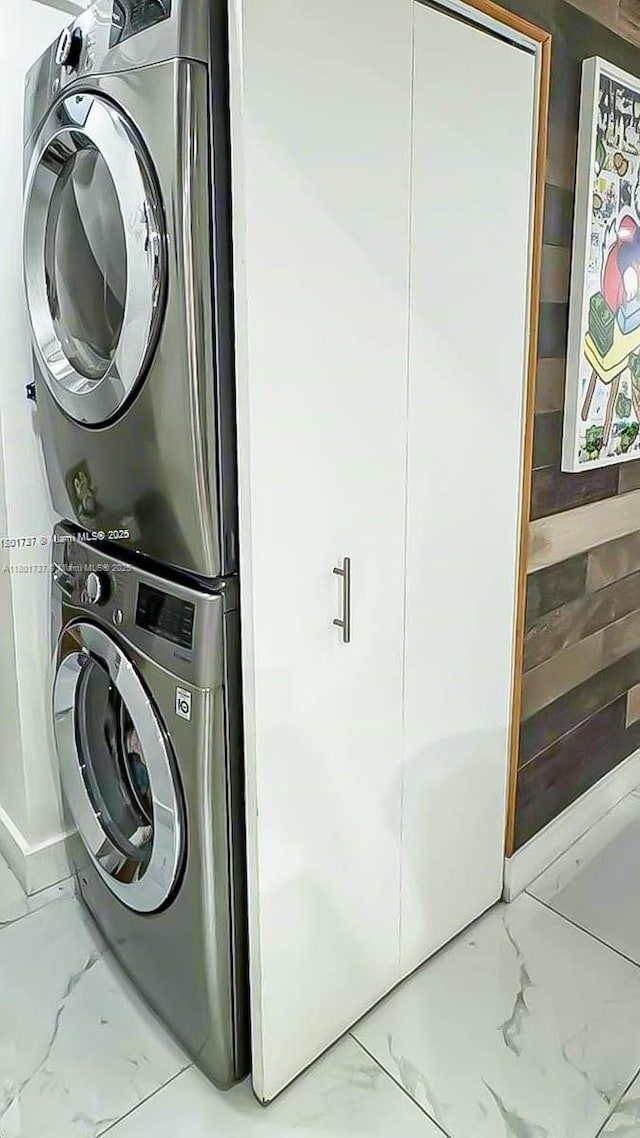 6355 SW 138th Path Unit 6355, Miami, FL 33183 - washroom with stacked washing machine and dryer and marble finish floors