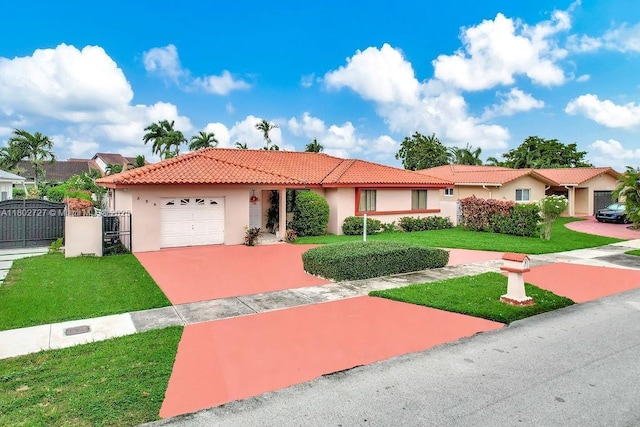 330 SW 133rd Ct, Miami, FL 33184 - view of front facade with stucco siding, a garage, a tile roof, and driveway