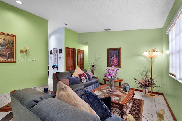 330 SW 133rd Ct, Miami, FL 33184 - living room featuring tile patterned floors, baseboards, recessed lighting, and a textured ceiling