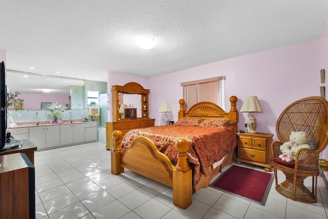330 SW 133rd Ct, Miami, FL 33184 - bedroom featuring a textured ceiling and light tile patterned floors