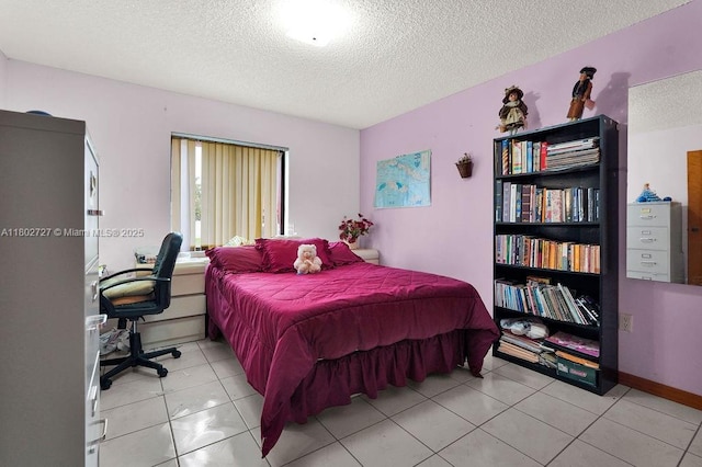 330 SW 133rd Ct, Miami, FL 33184 - bedroom with a textured ceiling and light tile patterned flooring