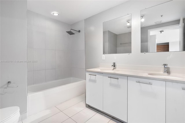 3250 NE 1st Ave Unit 706, Miami, FL 33137 - bathroom with toilet, double vanity, tub / shower combination, and tile patterned floors