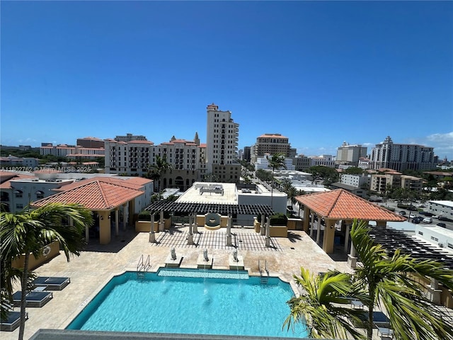 1607 Ponce De Leon Blvd Unit 8B, Coral Gables, FL 33134 - community pool featuring a gazebo, a patio area, and a city view