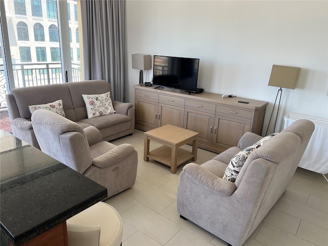 1607 Ponce De Leon Blvd Unit 8B, Coral Gables, FL 33134 - living area with light tile patterned floors