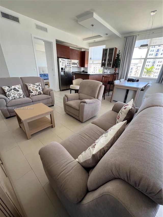 1607 Ponce De Leon Blvd Unit 8B, Coral Gables, FL 33134 - living area with light tile patterned floors