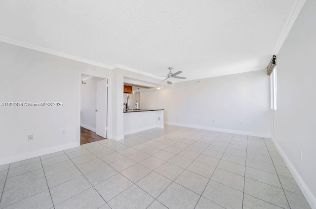 800 N Miami Ave Unit E-1709, Miami, FL 33136 - unfurnished living room featuring a ceiling fan, a textured ceiling, light tile patterned flooring, ornamental molding, and baseboards
