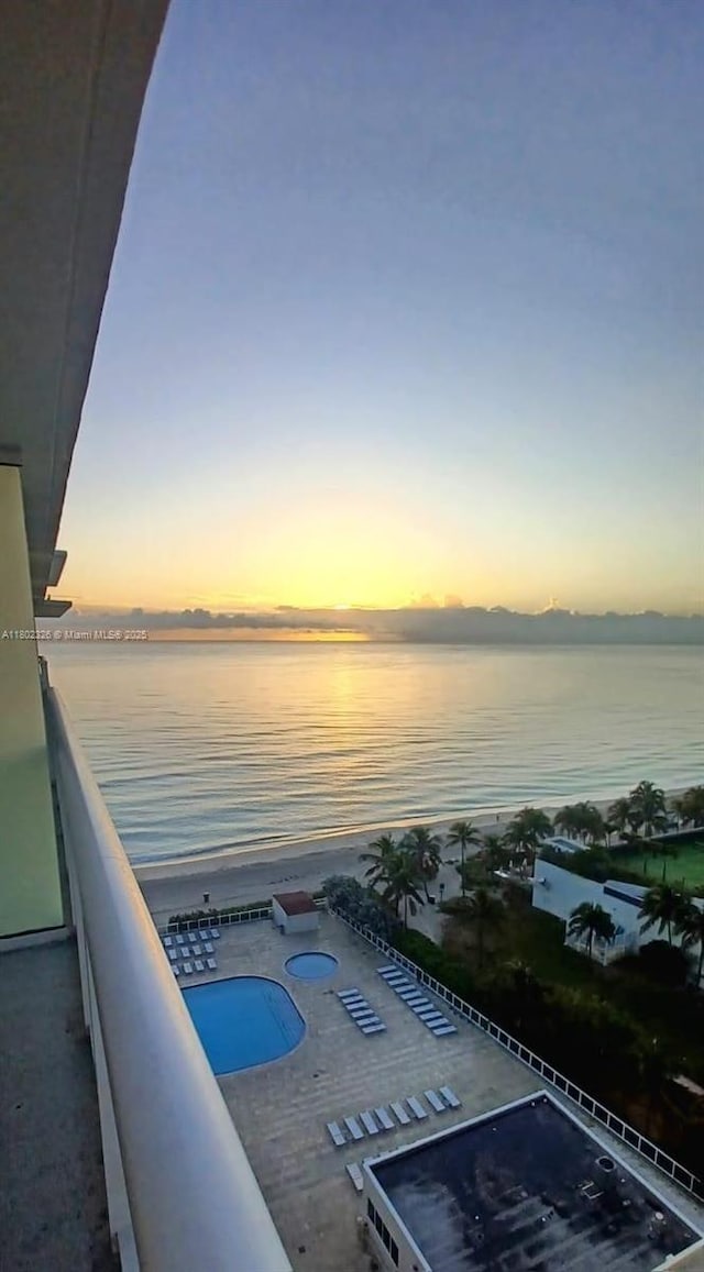19201 Collins Ave Unit 1105, Sunny Isles Beach, FL 33160 - pool at dusk with a water view