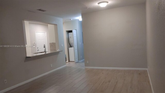 1165 Golden Lakes Blvd Unit 1221, West Palm Beach, FL 33411 - empty room with light wood-style floors