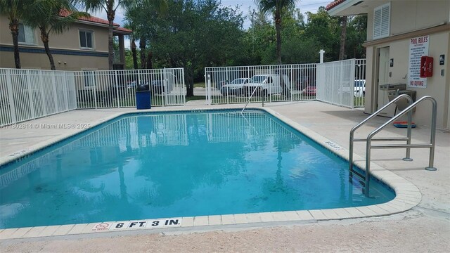 1165 Golden Lakes Blvd Unit 1221, West Palm Beach, FL 33411 - balcony with a water view