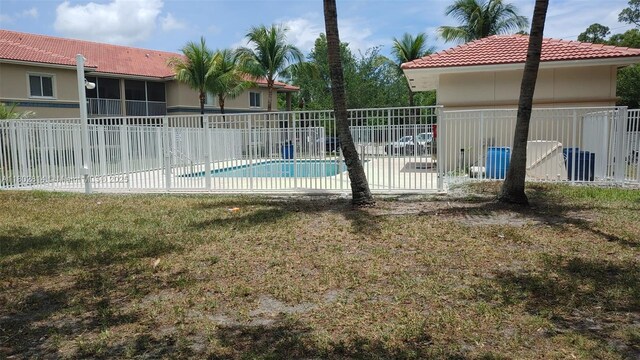 1165 Golden Lakes Blvd Unit 1221, West Palm Beach, FL 33411 - unfurnished room featuring ceiling fan and wood finished floors