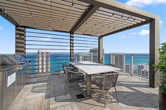 4010 S Ocean Dr Unit T3607, Hollywood, FL 33019 - wooden deck with a water view and outdoor dining area