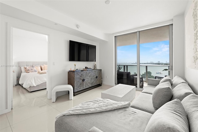 488 NE 18th St Unit 704, Miami, FL 33132 - living room featuring a wall of windows and light tile patterned floors