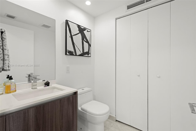 488 NE 18th St Unit 704, Miami, FL 33132 - half bath featuring toilet, vanity, recessed lighting, and tile patterned flooring