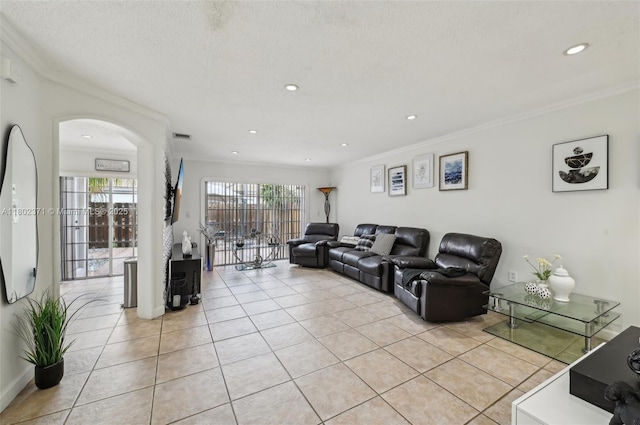 7377 SW 162nd Path, Miami, FL 33193 - living area featuring ornamental molding, light tile patterned floors, arched walkways, and recessed lighting