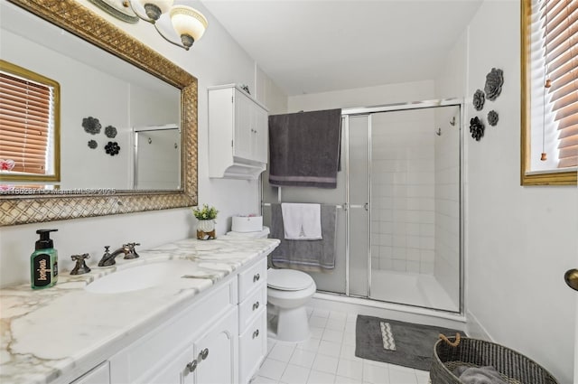 7377 SW 162nd Path, Miami, FL 33193 - bathroom with tile patterned flooring, toilet, vanity, and a stall shower