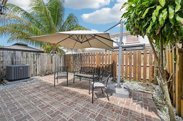 7377 SW 162nd Path, Miami, FL 33193 - fenced backyard featuring cooling unit, a gazebo, and a patio