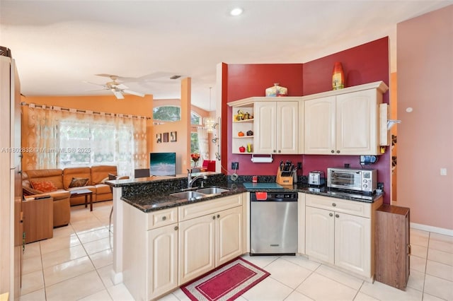 kitchen with dishwasher, a sink, a peninsula, lofted ceiling, and open floor plan