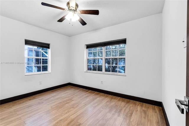 8335 E Crespi Blvd Unit 4, Miami Beach, FL 33141 - unfurnished room with baseboards, wood finished floors, and ceiling fan
