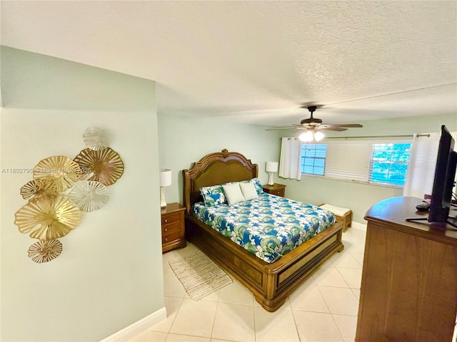 3051 S Palm Aire Dr Unit 203, Pompano Beach, FL 33069 - bedroom with baseboards, a ceiling fan, and light tile patterned floors