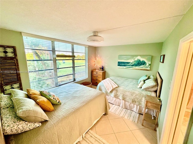 3051 S Palm Aire Dr Unit 203, Pompano Beach, FL 33069 - bedroom featuring light tile patterned floors
