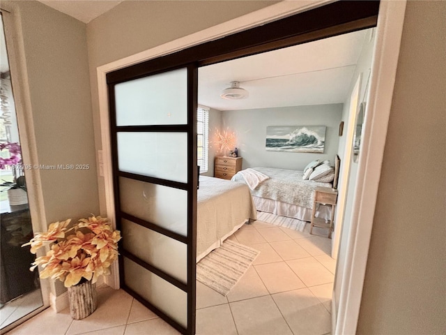 3051 S Palm Aire Dr Unit 203, Pompano Beach, FL 33069 - bedroom with light tile patterned floors