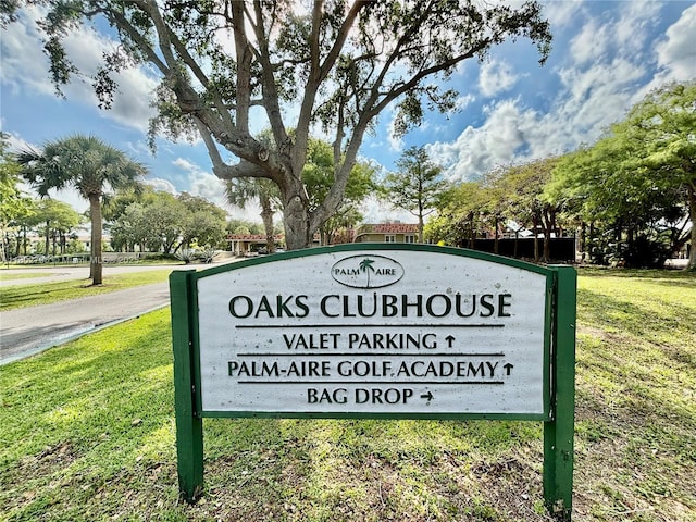 3051 S Palm Aire Dr Unit 203, Pompano Beach, FL 33069 - community sign with a yard