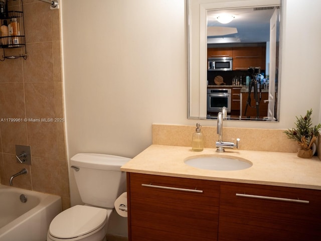 2681 N Flamingo Rd Unit 1206S, Sunrise, FL 33323 - bathroom featuring toilet, vanity, and bathing tub / shower combination