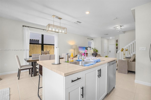 25280 SW 108th Ct, Homestead, FL 33032 - kitchen featuring dishwasher, light tile patterned floors, a sink, open floor plan, and recessed lighting