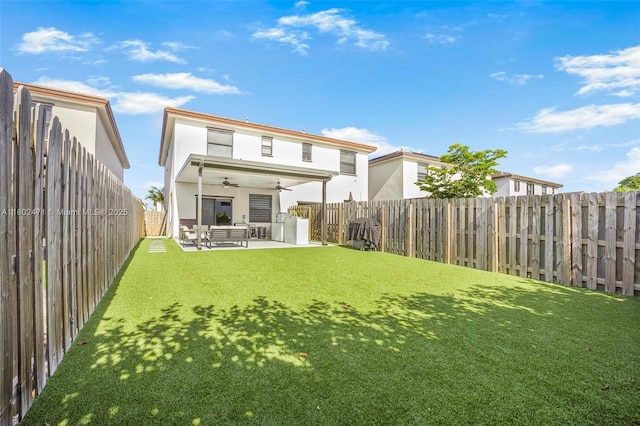 25280 SW 108th Ct, Homestead, FL 33032 - back of property featuring a ceiling fan, stucco siding, and a patio