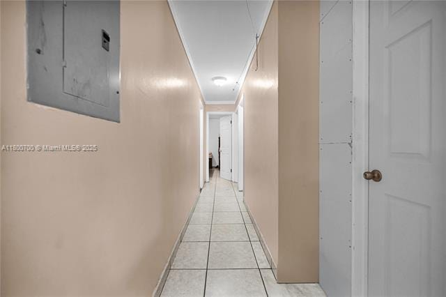3446 NW 1st Ave, Miami, FL 33127 - hallway featuring electric panel, light tile patterned flooring, and baseboards