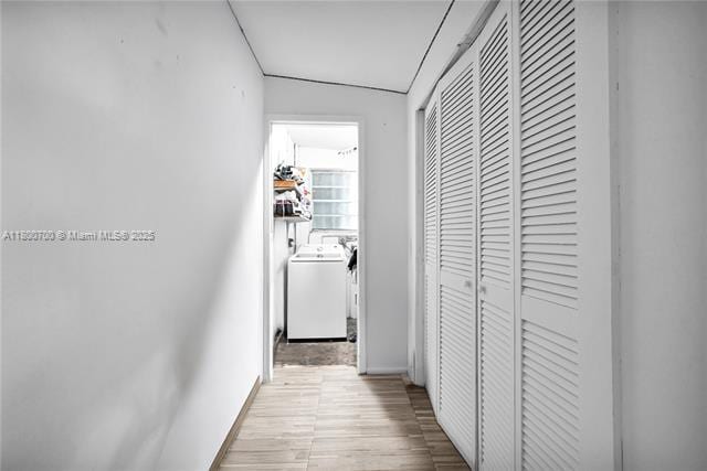 3446 NW 1st Ave, Miami, FL 33127 - hallway featuring baseboards and wood finished floors