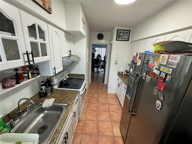 9260 Bay Harbor Ter Unit 24, Bay Harbor Islands, FL 33154 - kitchen with white electric range oven, a sink, stainless steel refrigerator with ice dispenser, light tile patterned floors, and white cabinets