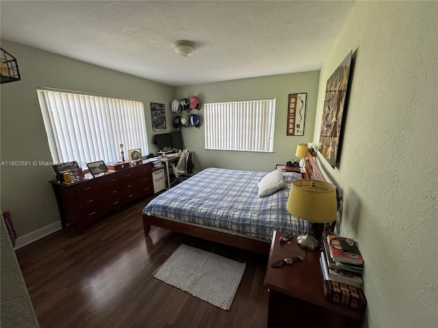 9260 Bay Harbor Ter Unit 24, Bay Harbor Islands, FL 33154 - bedroom with wood finished floors, a textured ceiling, and a textured wall