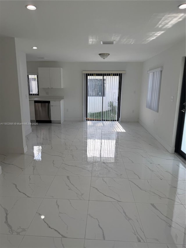210 SW 3rd St, Florida City, FL 33034 - unfurnished room with light marble finish flooring, baseboards, and recessed lighting
