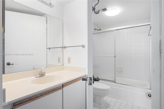 540 Brickell Key Dr Unit 904, Miami, FL 33131 - full bath with toilet, tile patterned flooring, vanity, and bath / shower combo with glass door