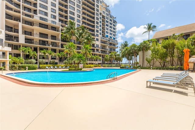 540 Brickell Key Dr Unit 904, Miami, FL 33131 - community pool featuring a patio area