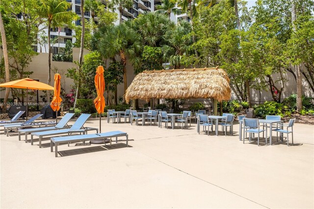 540 Brickell Key Dr Unit 904, Miami, FL 33131 - surrounding community with outdoor dining area and a patio