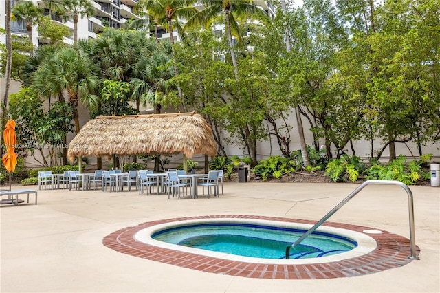 540 Brickell Key Dr Unit 904, Miami, FL 33131 - view of pool with a community hot tub, a patio, a gazebo, and outdoor dining space
