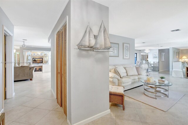 6001 SW 18th St, Plantation, FL 33317 - corridor featuring plenty of natural light, light tile patterned floors, and baseboards