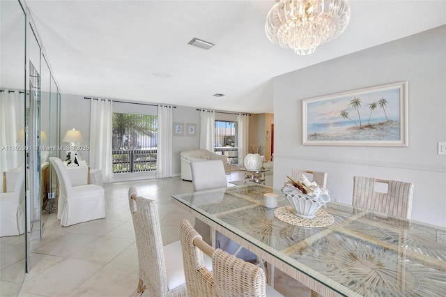 6001 SW 18th St, Plantation, FL 33317 - dining space with light tile patterned flooring and a chandelier