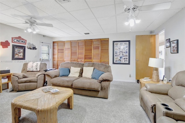 6001 SW 18th St, Plantation, FL 33317 - carpeted living room with a ceiling fan, a drop ceiling, and baseboards