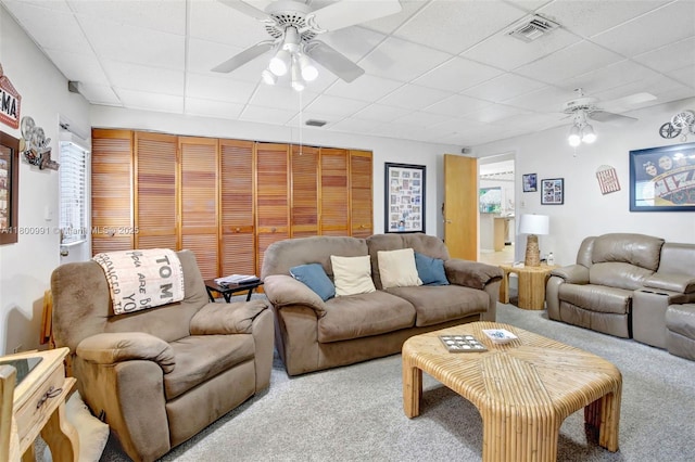 6001 SW 18th St, Plantation, FL 33317 - living room with a ceiling fan, a drop ceiling, and carpet flooring
