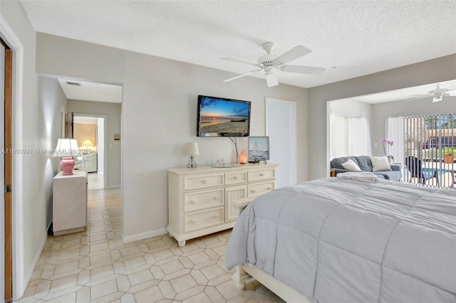 6001 SW 18th St, Plantation, FL 33317 - bedroom featuring baseboards, a textured ceiling, access to exterior, and ceiling fan