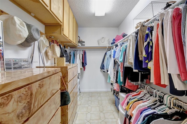 6001 SW 18th St, Plantation, FL 33317 - walk in closet featuring light tile patterned floors