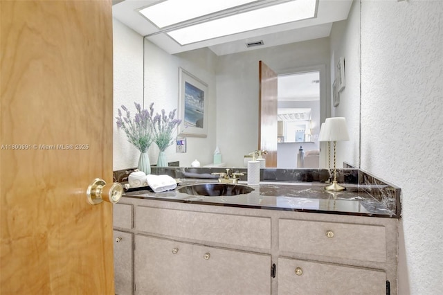 6001 SW 18th St, Plantation, FL 33317 - bathroom with a textured wall and vanity